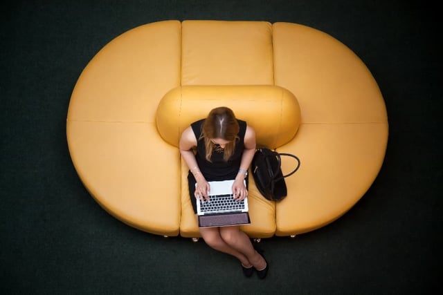 Woman accessing unsecured wireless network